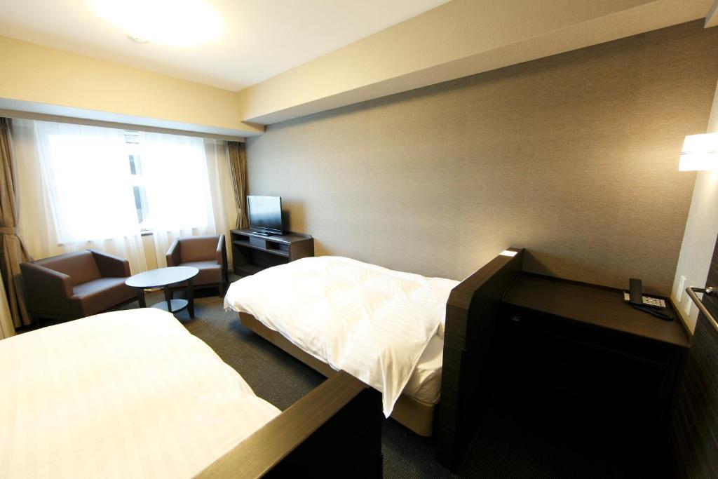 Dormy Inn Кагошима Стая снимка